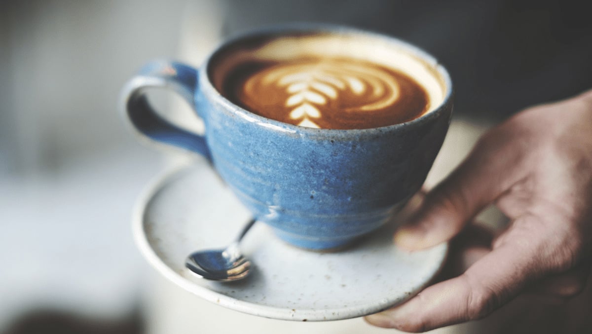 Arjo serving coffee